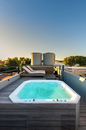 Enjoy our completely private rooftop Jacuzzi terrace after a day exploring BA!
