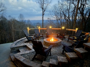 Imagine ending your day gathered around a crackling fire, sharing stories and laughter with loved ones. Our fire pit area offers the perfect blend of warmth, ambiance, and scenic views, creating unforgettable moments during your stay at
