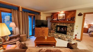 Cozy Living Room Setting with Ski Hill Views
