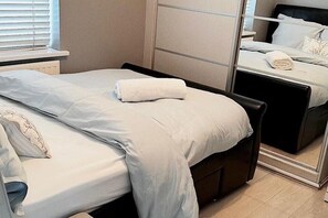 Large built-in wardrobe and garden view 