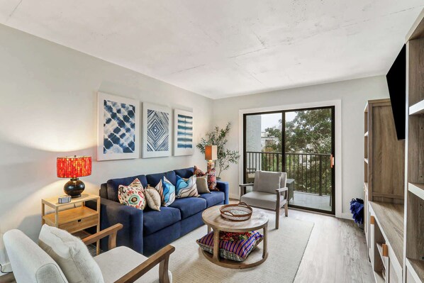 Spacious living area with a queen sofa sleeper 
