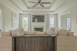 Bright, airy living room with plenty of natural light.

