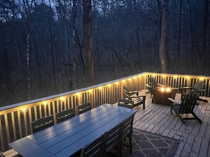 Night view  of back deck with railing lights