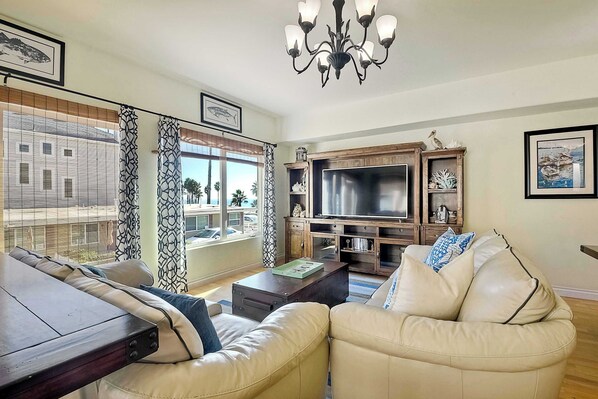 Curl up in the elegant living room & stream your favorites on the smart TV
