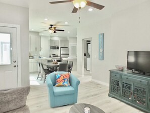 Living, dining, and kitchen area