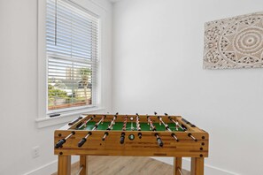 Delight in a spirited game of foosball.
