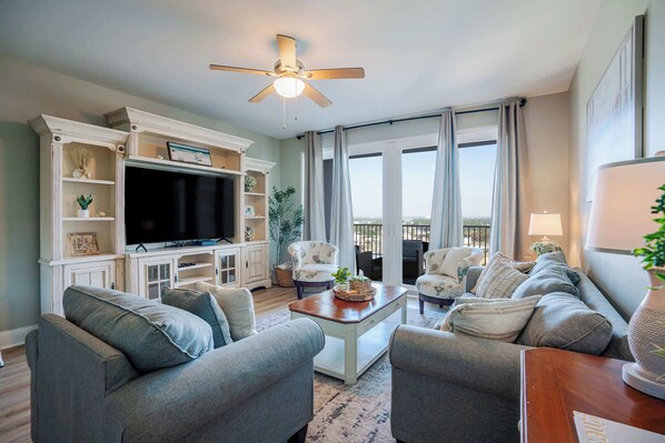Living room w/ balcony and views!