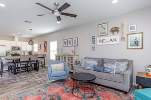 Living, dining, and kitchen area