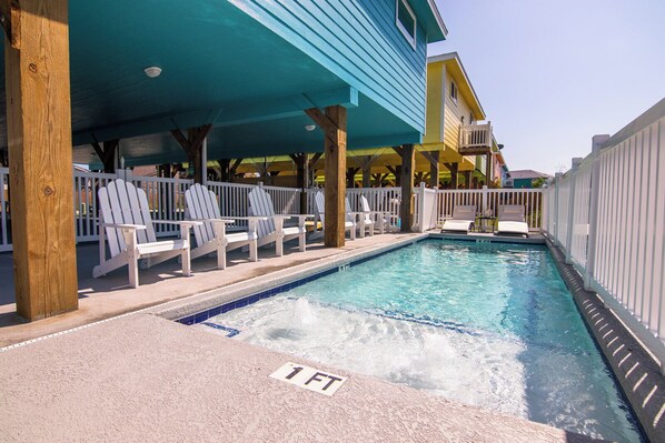 Pool with lounge chairs