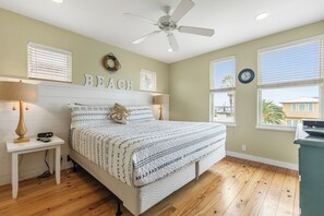 Second floor primary bedroom with king, smart TV and ensuite full bath