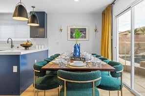 Group dining anyone? 10-Seat group dining table immediately next to the kitchen to serve your food as fast as possible.-Adventure Awaits
