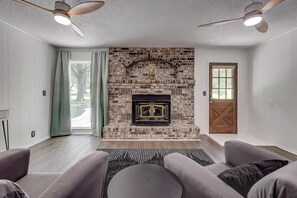 Enter through the back door off the patio and into a quiet sitting room.