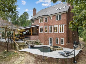 Outdoor kitchen, pool and hot tub, lake view and short walk to private boat dock