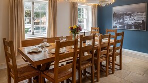 Flooded with light the dining room is a wonderful space