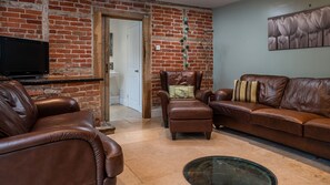 Get cosy in the snug where an old well is a unique feature