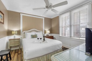 The room's design harmonizes comfort with style, featuring tasteful decor that enhances the calming ambiance.