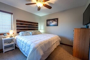 Master Bedroom with King Size Bed and Pocket Door to Bathroom