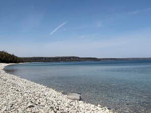 Shared community beach view. Devil's Monument is in the distance.