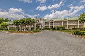 The entry of the condo includes a portico, ideal for unloading even in weather.