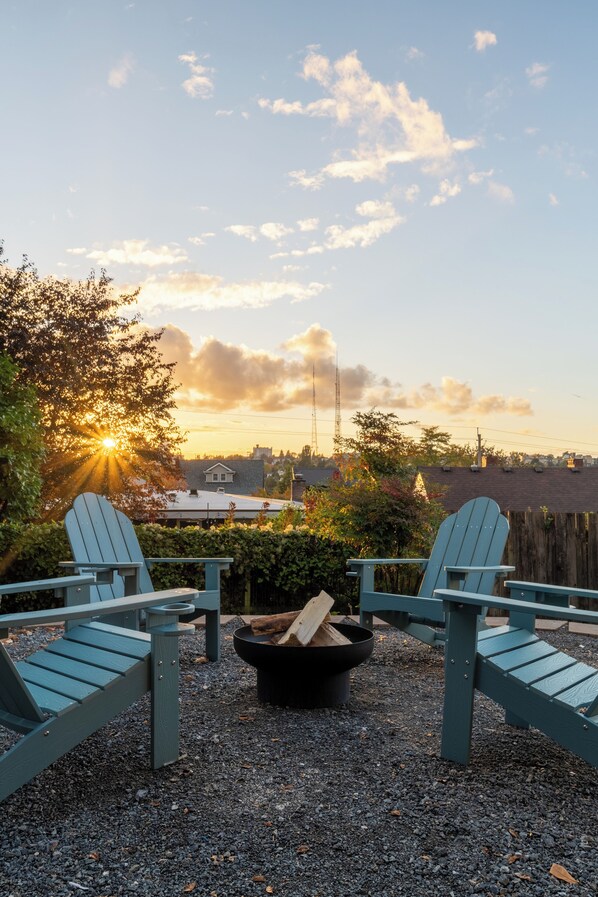 Enjoy the backyard with a cozy fire pit, perfect for gathering and unwinding.