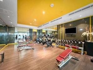 Gym Oasis: Energize your day in this vibrant space filled with top-notch fitness equipment!