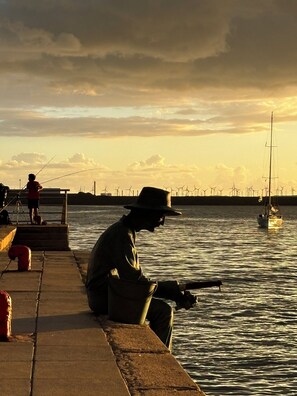 Arinaga Fisherman’s pier (7min walking distance)