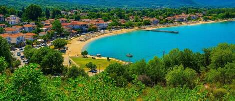 Just 200m from the pristine shores of Olympiada – your summer starts here.