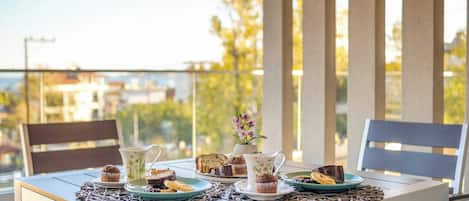 Enjoy your breakfast with a stunning Aegean view