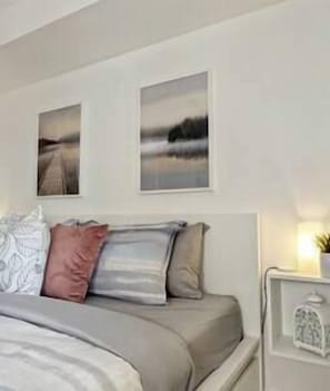Master bedroom with ensuite bathroom and high end king mattress.
