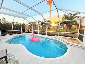 This is paradise, lounge pool with water feature and bug free enjoyment.
