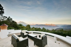 Shared Panoramic Area with a View of the "Volcan de Acatenango" behind and surrounded by Avocado Trees.