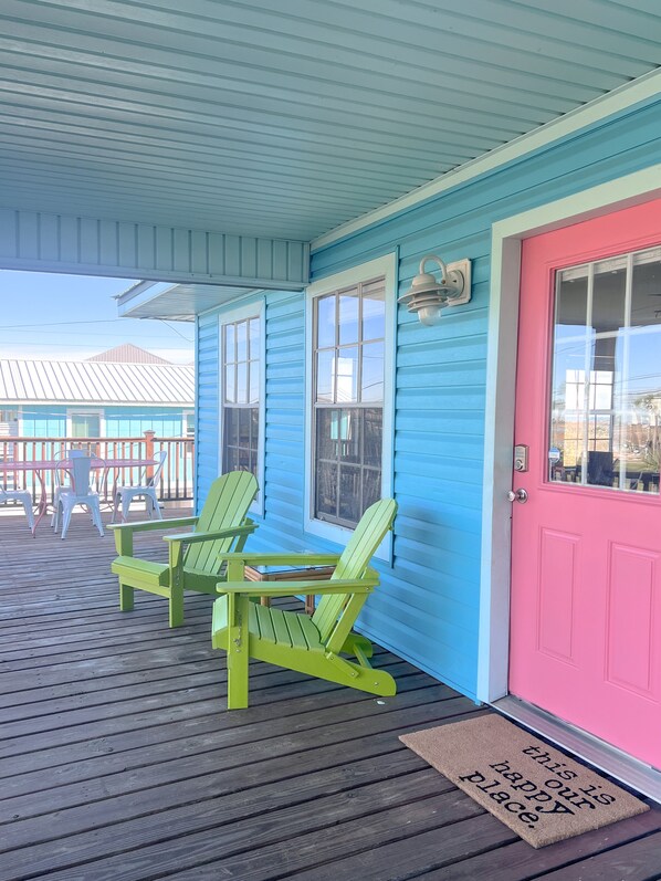 Welcoming front porch with views of the bay