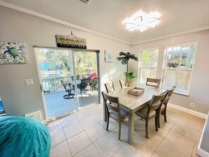 Dining rm seats 6 comfortably and 6 more right in the screen patio & 5 more 