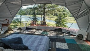 What a view from your oversized King Bed with premium designer bedding.