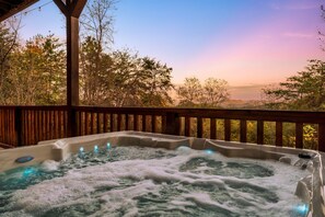 Soak in the warm bubbles of our private hot tub while gazing at long-range mountain views. This is mountain living at its finest.