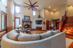 Open and inviting living room with warm and comfortable furnishings.