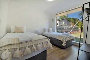 Bedroom 4 - 2x King Single Beds