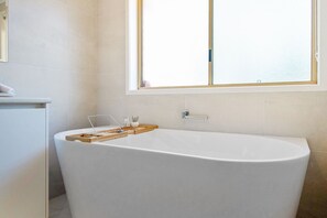 Main Bathroom - Shower, Bath + Hair Dryer