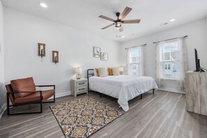 The Primary Bedroom is the perfect place after a day of golf or fun on the beach.