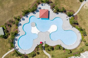 Guests can enjoy the Barefoot Resort pool about a .5 mile away