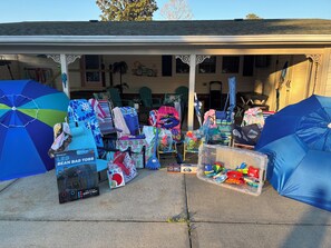 Umbrellas, beach chairs & towels, beach bags, & outdoor games & beach toys!