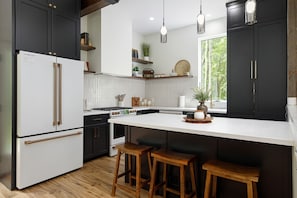the spacious kitchen with 10 ft. ceilings and plenty of storage.
