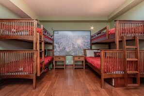 The bunk room with 2 bunk beds and a Queen bed