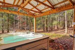 Take a relaxing soak in the private hot tub! 