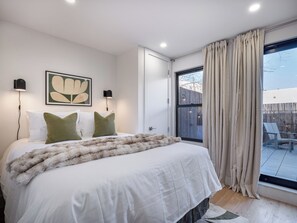 Bedroom #2 - Queen sized bed with 65 inch Smart TV (Black out window shades)