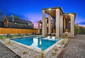 Another view of Stillwater’s outdoor area, complete with a heated pool and ample seating. This is where relaxation meets luxury.