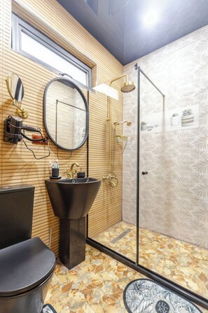 Well-equipped bathroom with complimentary essentials..
