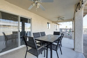 Covered Patio | Outdoor Dining Area | Gas Grill | Fenced Backyard