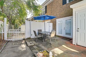 Townhome Exterior | Furnished Patio | Dining Area | Charcoal Grill