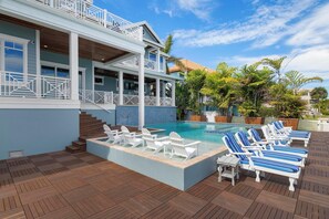 Huge pool, hot tub sized for 12+, waterfall wall, LED lights and sun-shelf